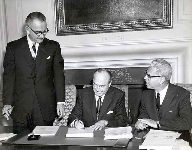 James S. McDonnell at the White House signing Plans for Progress with Vice President Lyndon B. Johnson and Secretary of Labor Arthur Goldberg.