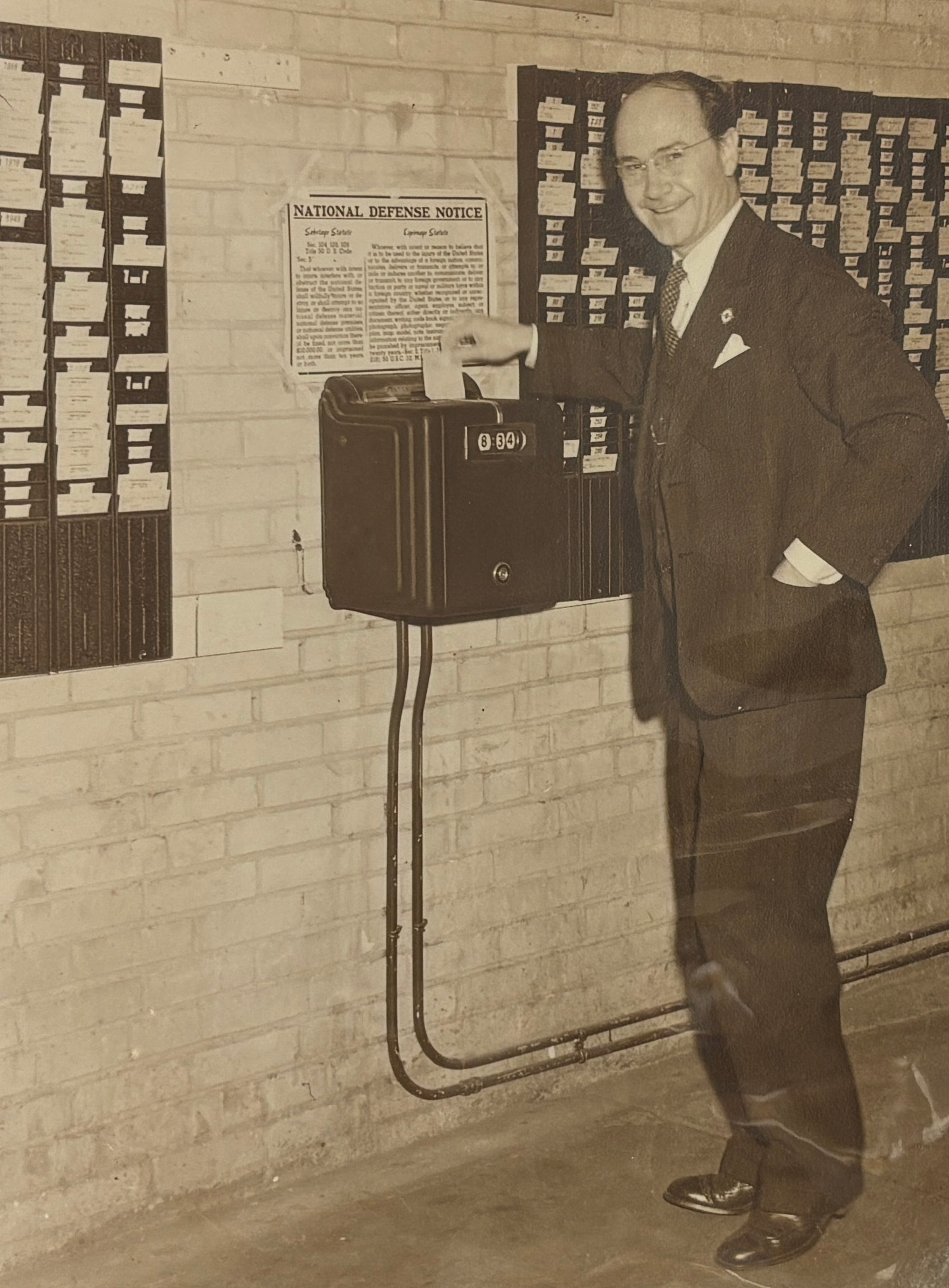 James S. McDonnell punching in at a time clock at McDonnell Aircraft.
