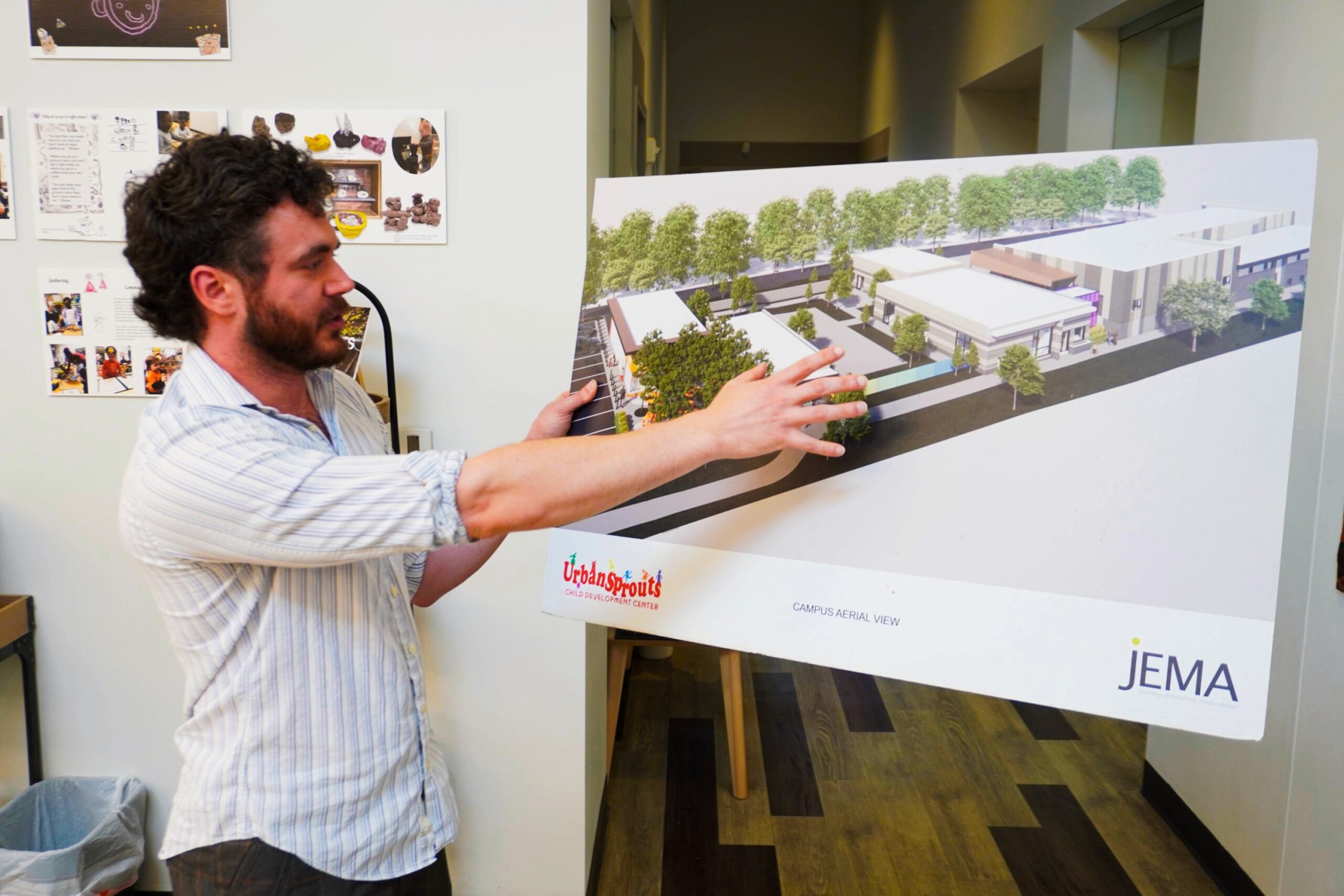 Urban Sprouts staff member sharing a rendering of the facility expansion.